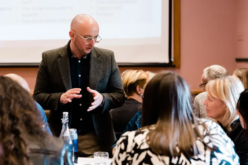 Martin Broadhurst delivering AI training to a team
